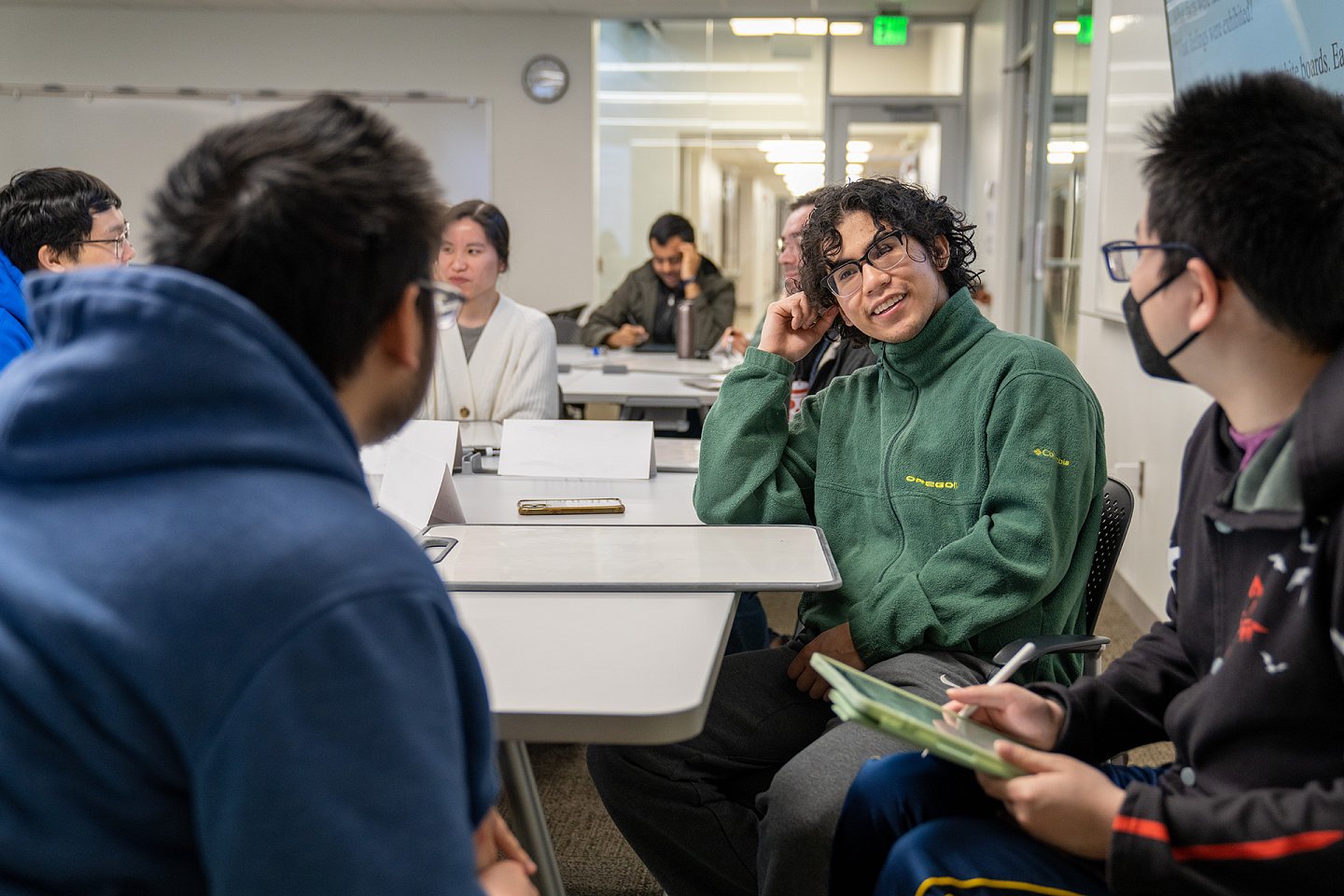 students talking in class