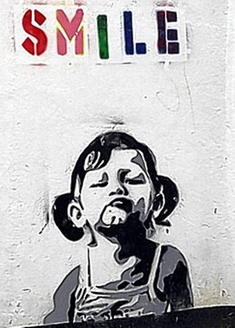 Smile, a graffiti piece by Banksy