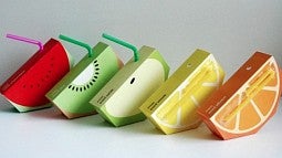 Photo of juice boxes shaped like various fruit slices.