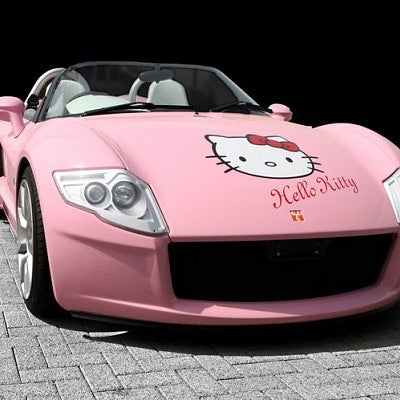 Photo of pink car with Hello Kitty pictured on the hood.